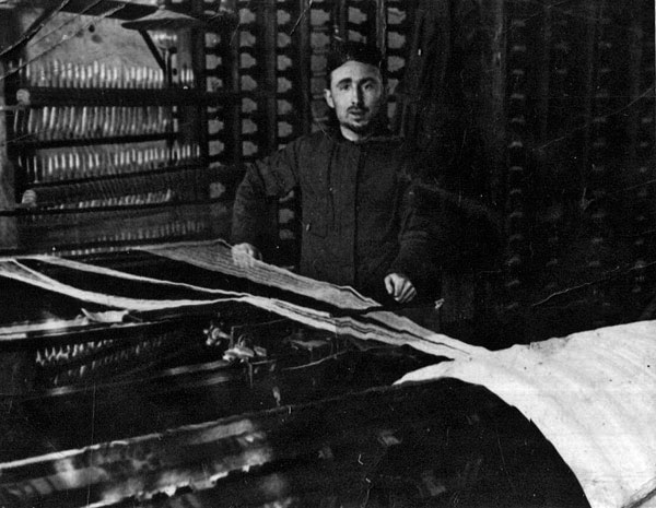 Aaron Przybylski at weaving factory in Belchatow.