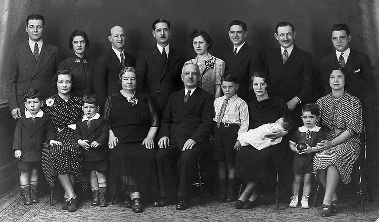 Rubin & Gussie Auerbach Family's Portrait
with young Harvey Cooper (1938)