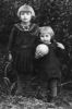Josepha Przybylski (holding ball) with cousin Chana