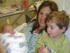 Aidan with Mom and new baby sister Ryan
